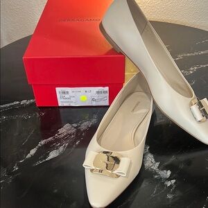 Ferragamo cream ballet flats with Gold Hardware